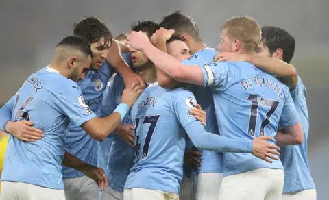 Show players yellow cards for hugging, suggests UK politician