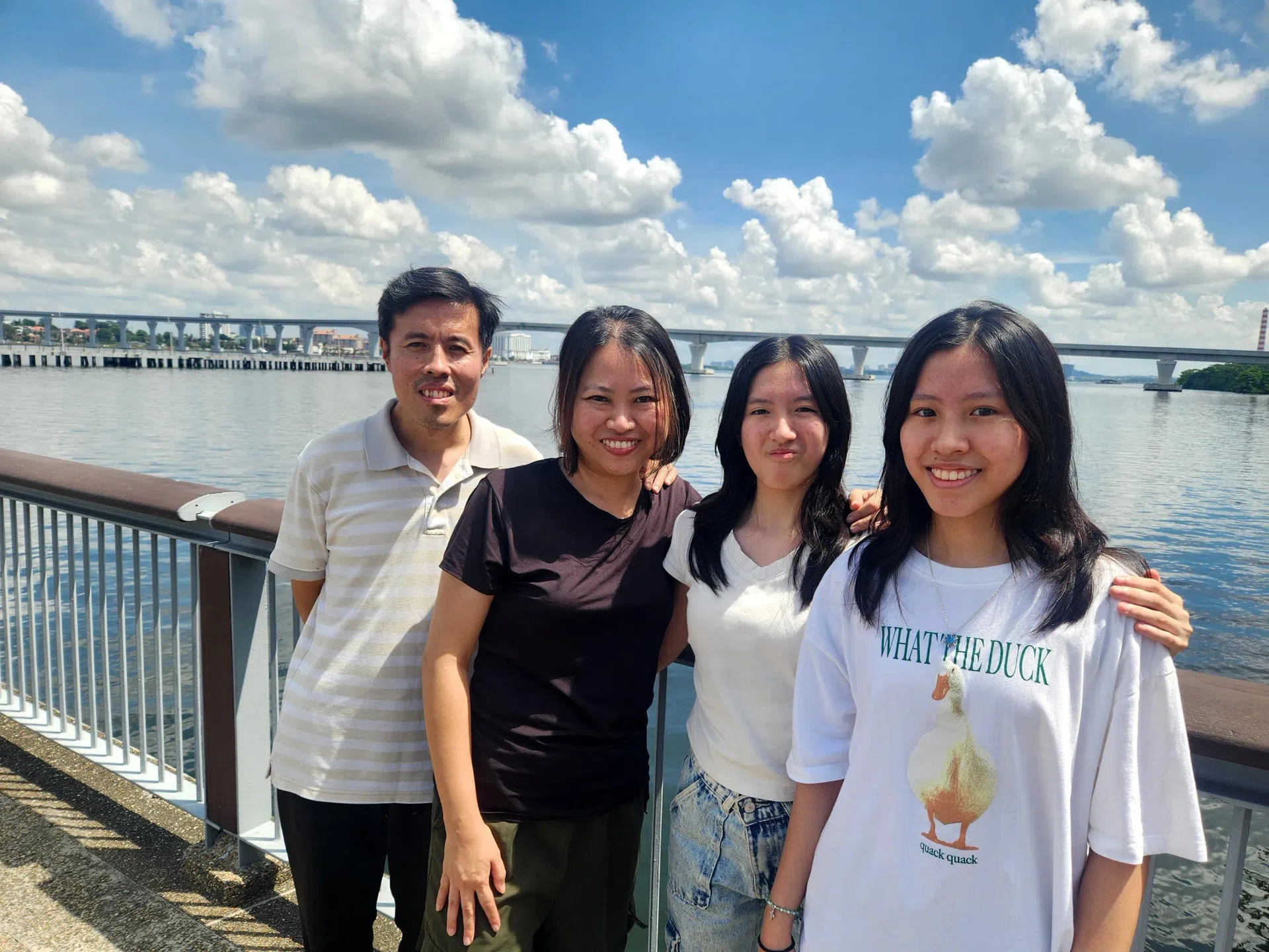 (From left) Mr Joash Liang and Ms Corrine Ang with their daughters Eleora and Elise. In pursuit of a slower, different lifestyle, they relocated first to Thailand, then to Malaysia in recent years.