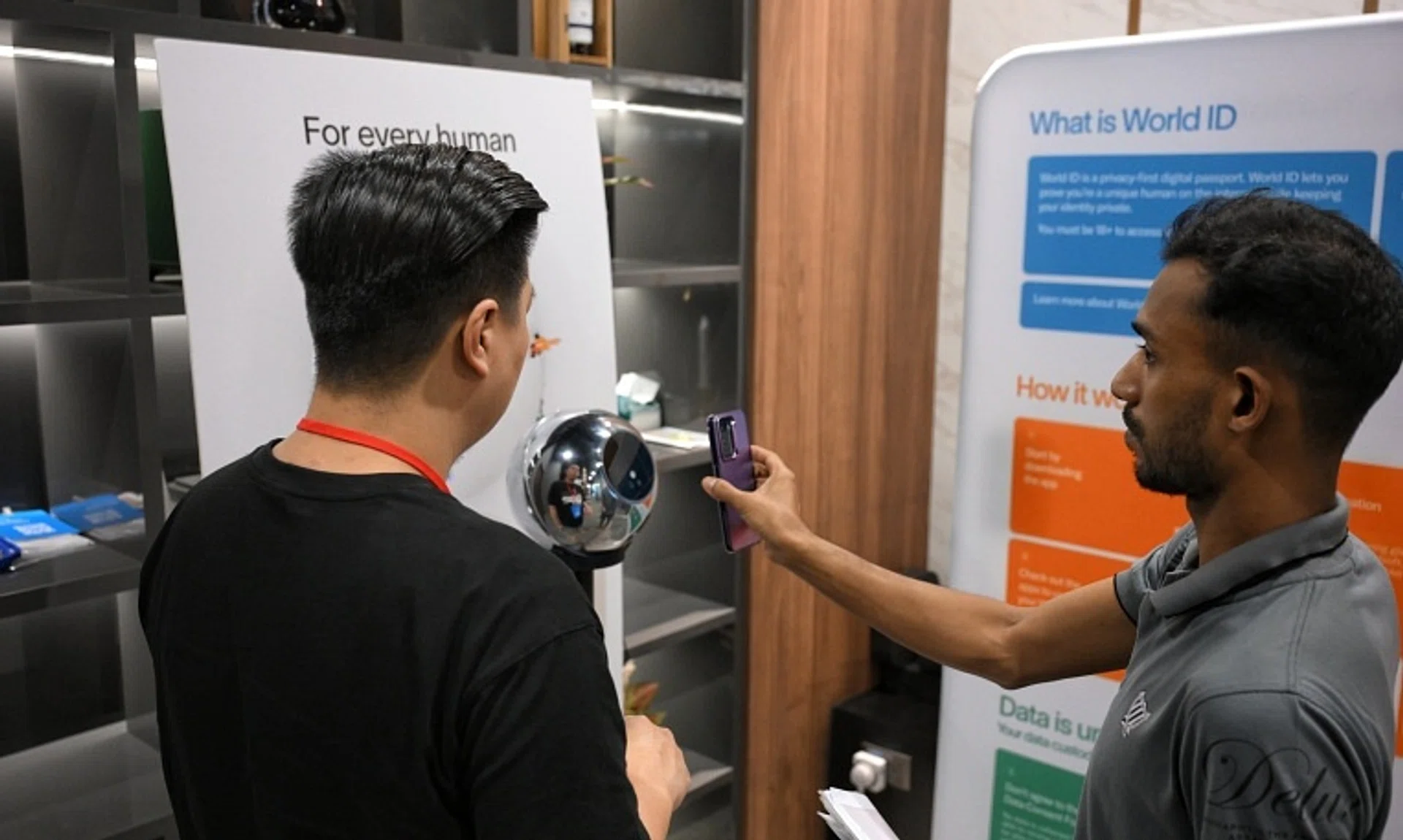 Worldcoin involves getting people to stare into a silver orb, and have their irises scanned in exchange for a digital ID and free tokens.