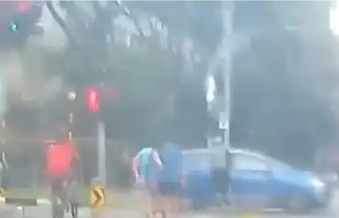'Not my problem what': Pedestrians watch on as jaywalking man gets hits by car in Sengkang