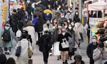Japan set to remove most Covid-19 restrictions as new infections ebb