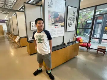 Autism no barrier for teenager and his love for art and calligraphy