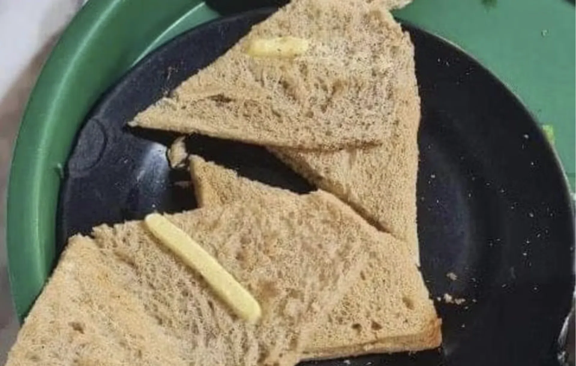 The matchstick-sized butter on the toast served to the complainant.