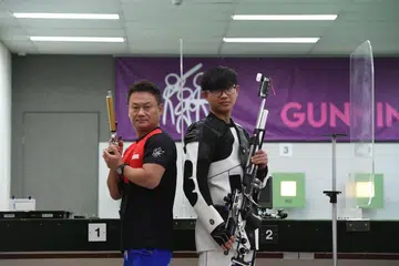 Family members shoot together for Singapore