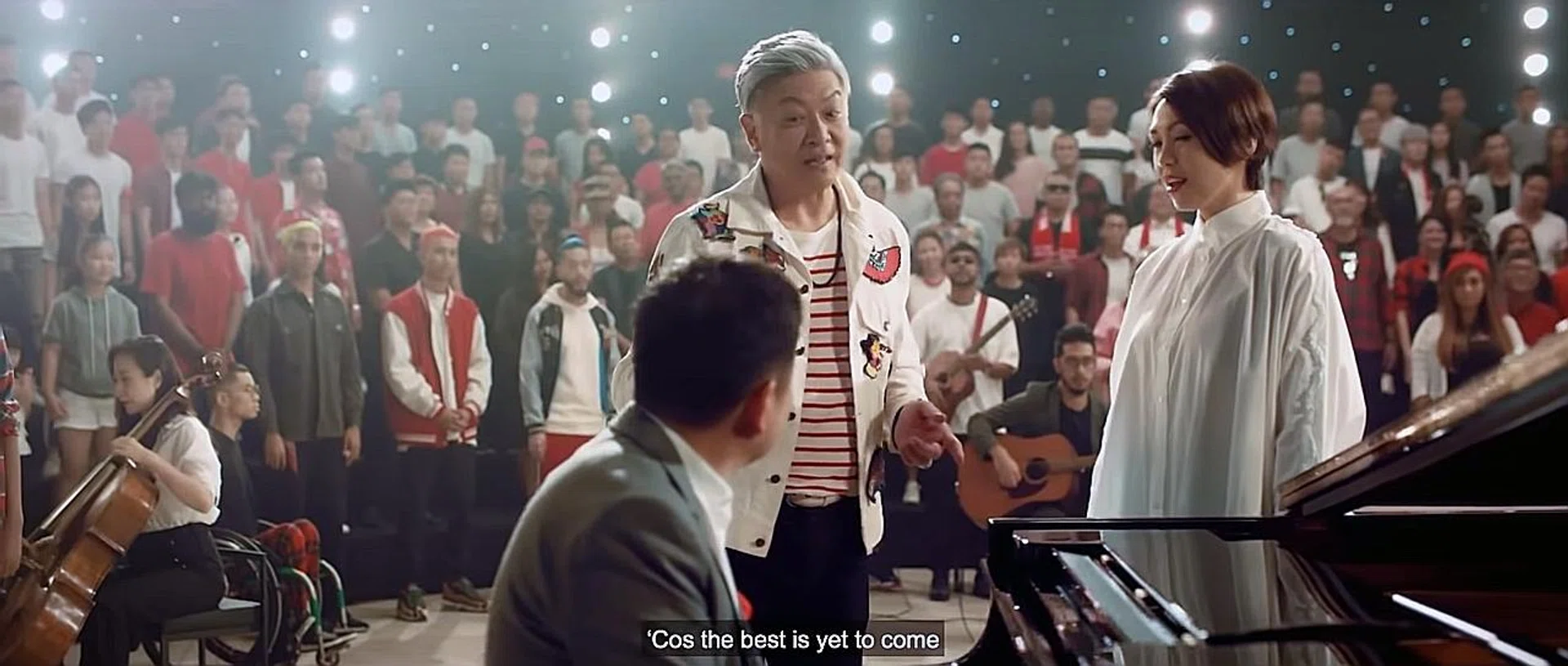 The music video for the song - by Dick Lee (centre, with singer Kit Chan) - features 300 performers. 