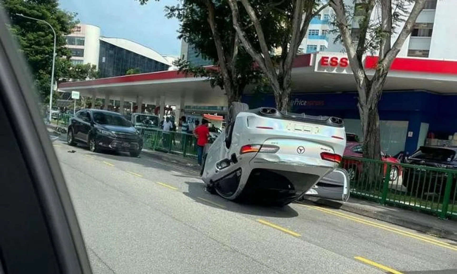 A Mercedes E300 AMG speeding at lane one on McPherson Road crashes and overturns on Feb 18 afternoon.