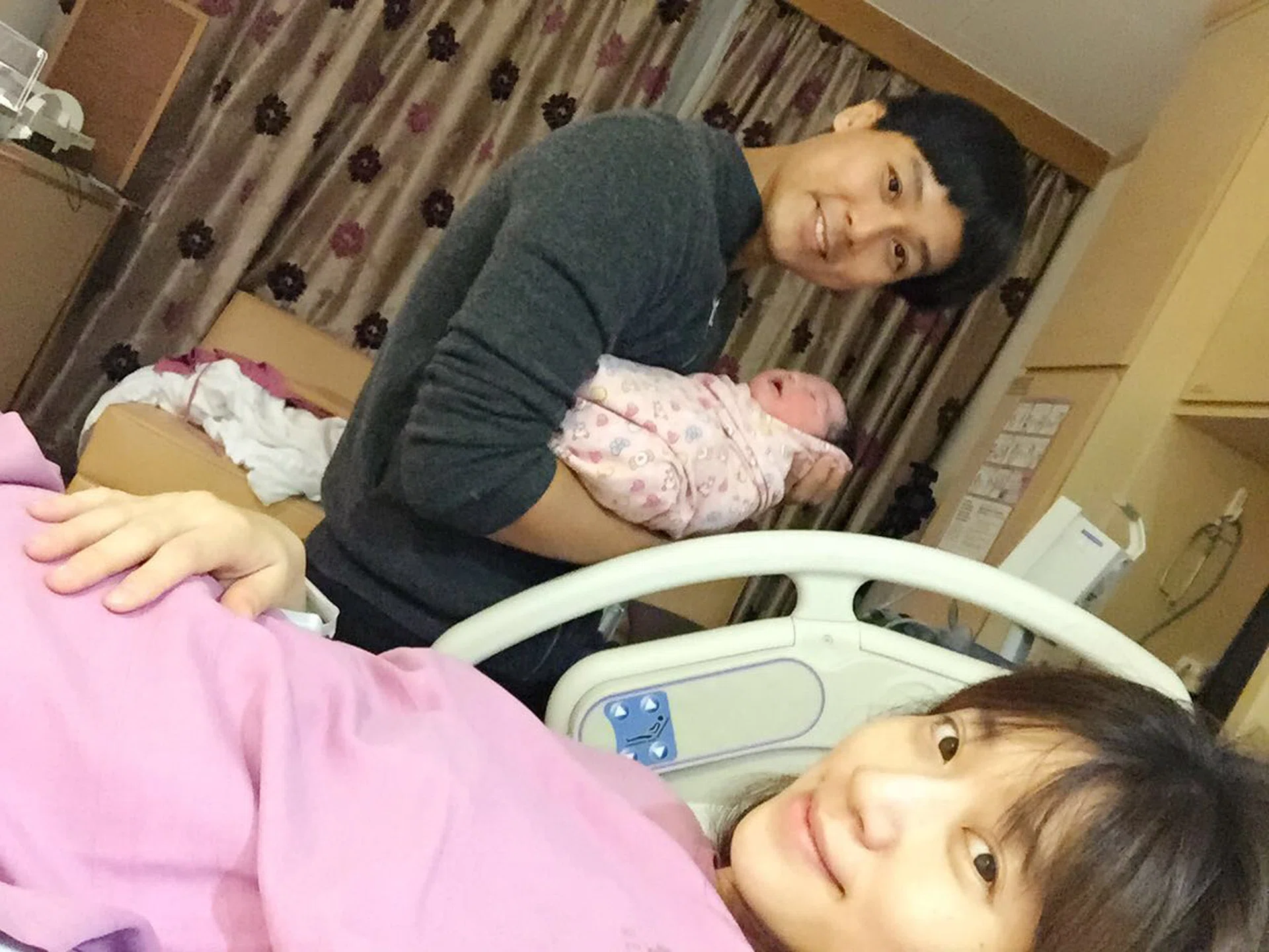 Relieved: Andie Chen and Kate Pang with their newborn daughter Avery. She weighs 3.65kg. 