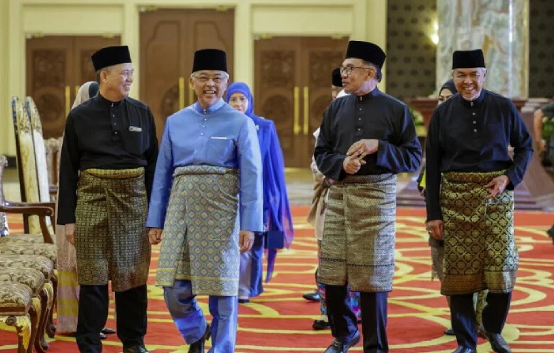 Malaysia's King, Sultan Abdullah Ahmad Shah (second from left), PM Anwar Ibrahim (third from left), DPM Fadillah Yusof (left) and DPM Zahid Hamidi at the national palace on Dec 2.