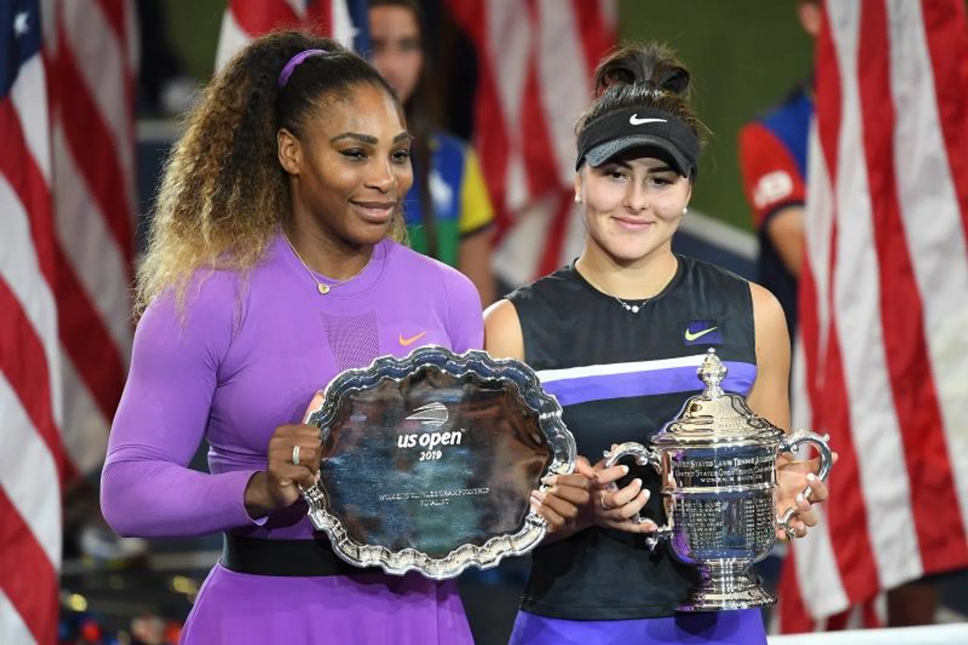 Bianca Andreescu (right) has denied Serena Williams a chance to equal Margaret Court's record of 24 Grand Slam titles.