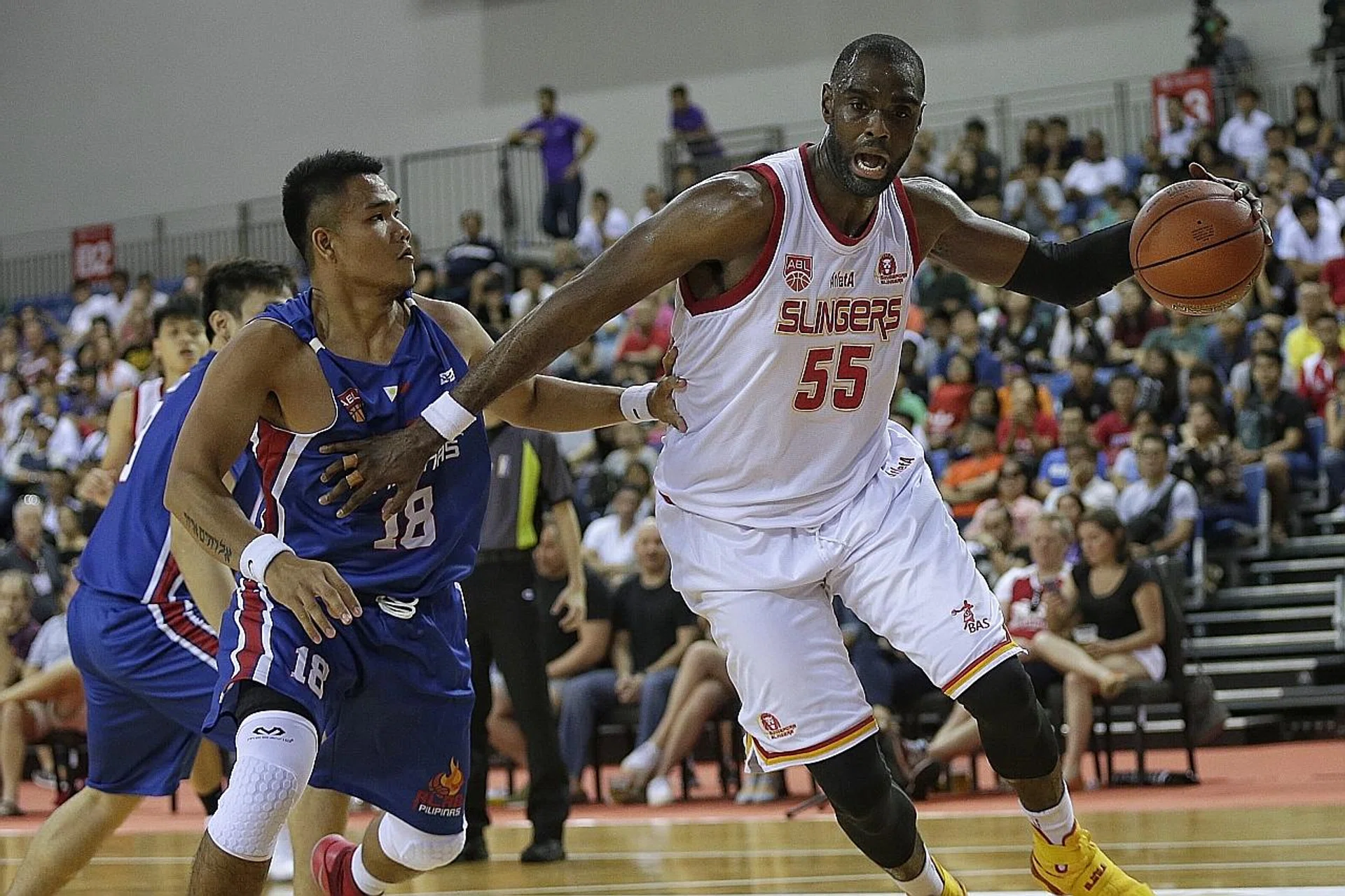 The Singapore Slingers have sorely missed the physical presence of the 2.11m-tall Justin Howard (in white), said coach Neo Beng Siang.