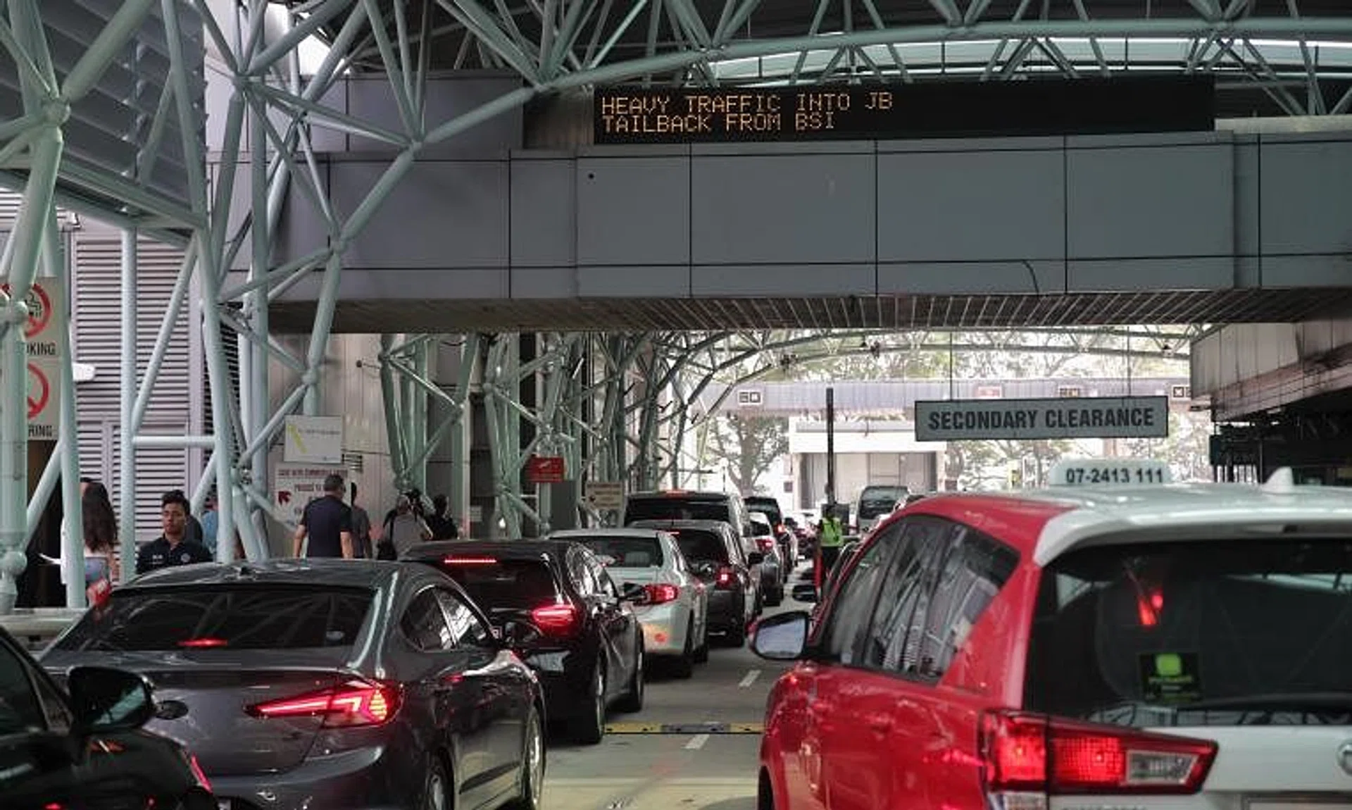 Travellers can expect very heavy traffic on March 29 and March 30 at both land checkpoints, ICA said.