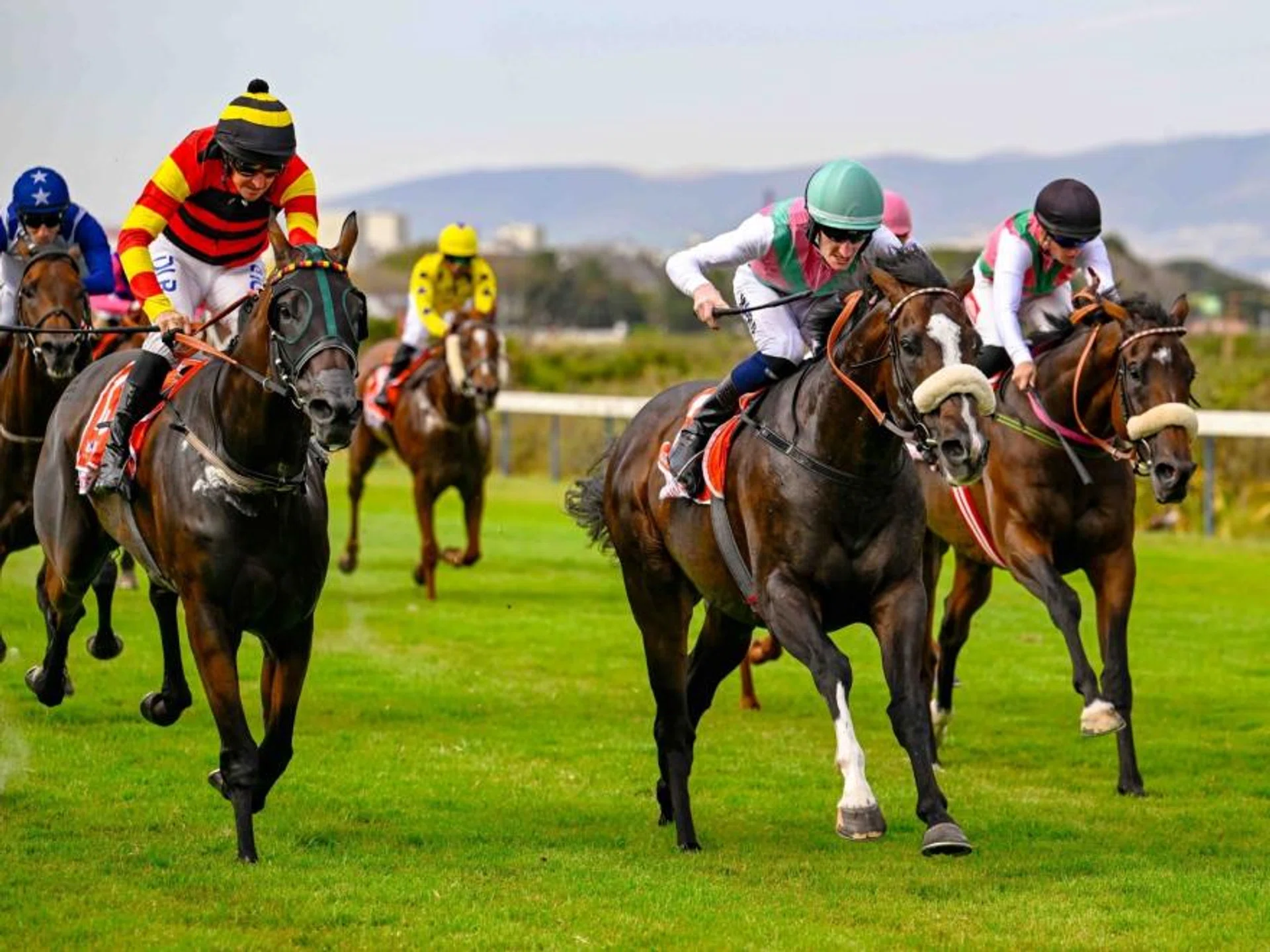 UK-based but Zimbabwean-born jockey Daniel Muscutt (green cap), son of ex-Kranji trainer Peter Muscutt, springing a major surprise aboard Double Superlative in the 2024 Grade 1 Cape Town Met (2,000m) at Kenilworth.
