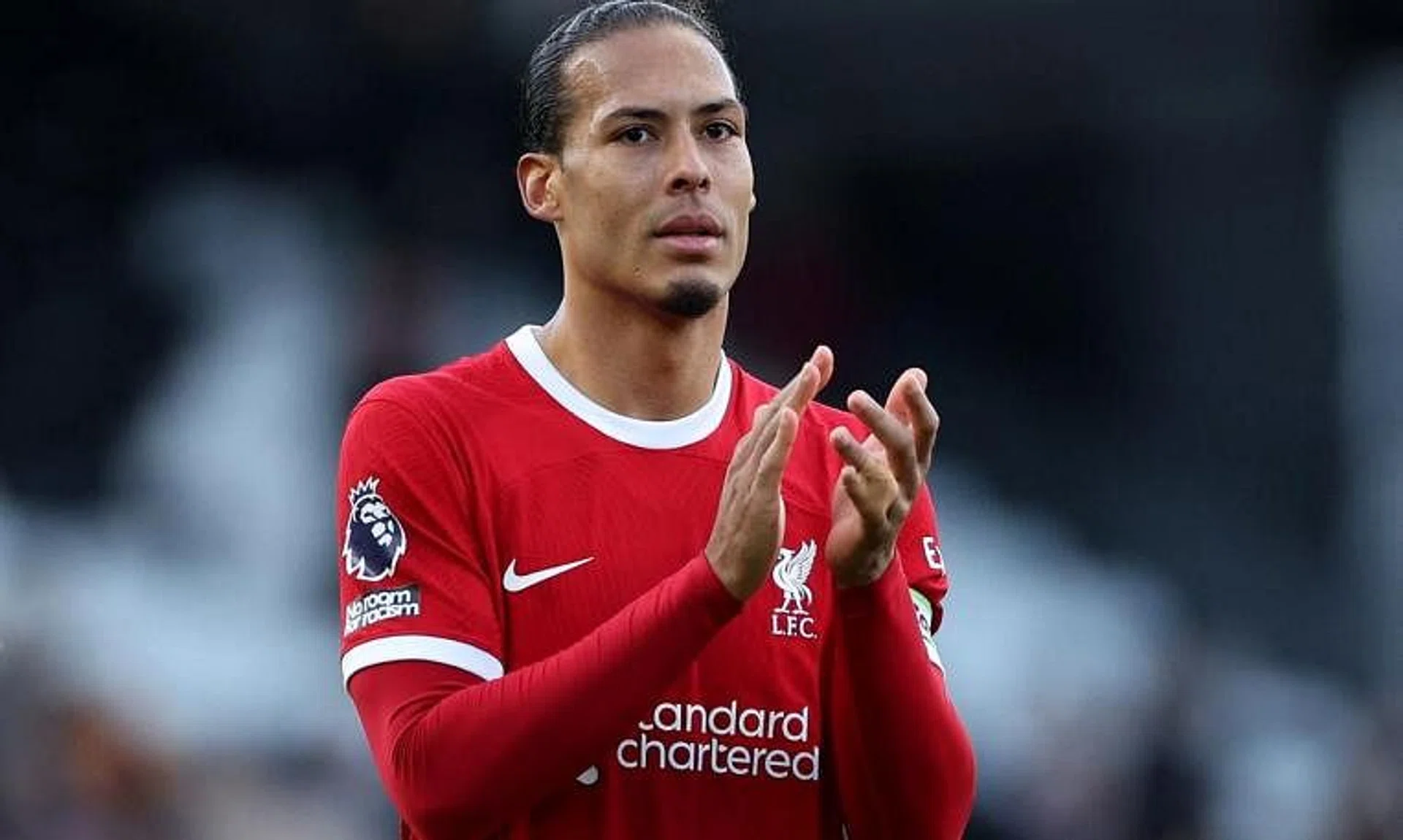 FILE PHOTO: Soccer Football - Premier League - Fulham v Liverpool - Craven Cottage, London, Britain - April 21, 2024 Liverpool's Virgil van Dijk applauds fans after the match Action Images via Reuters/Andrew Boyers