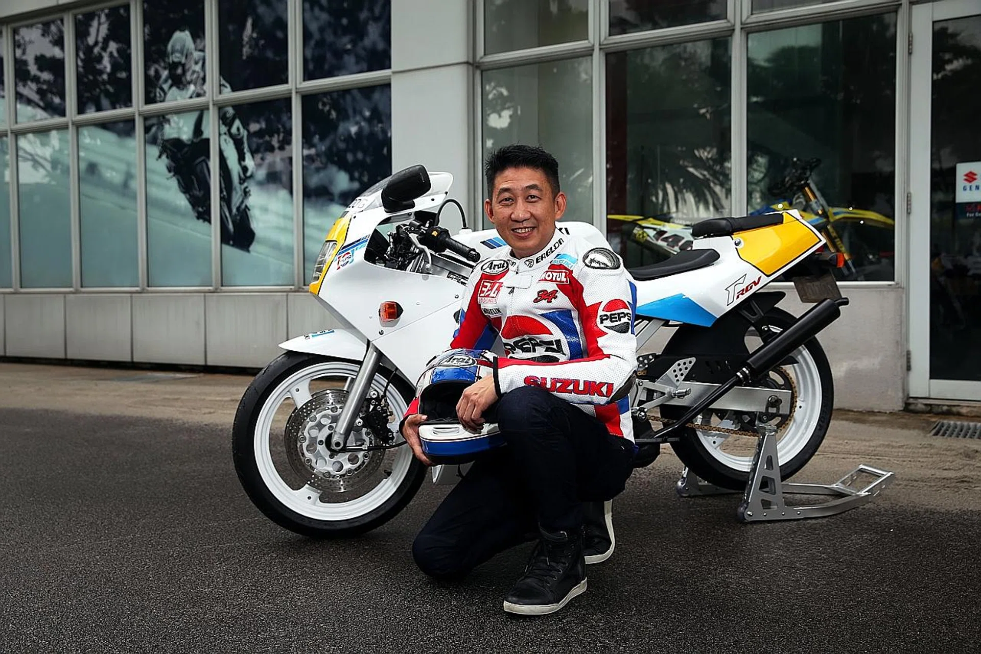 Mr Ong Chee Hoon with his restored Suzuki RGV250 VJ21, which he had bought in a bad condition in April last year.