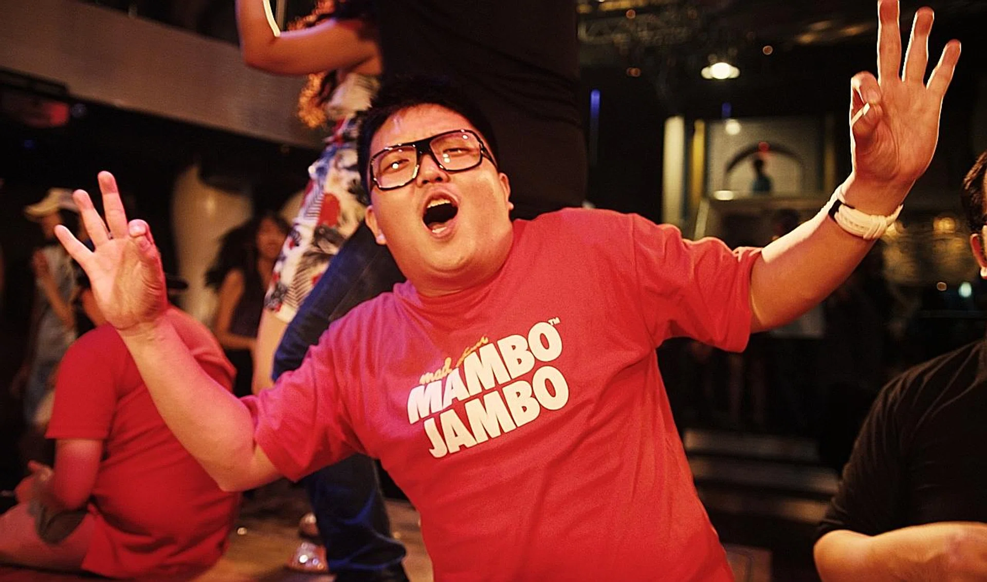 A still from Dave Tan's documentary Blame It On The Boogie. It captures people enjoying Zouk's Mambo Jambo nights.