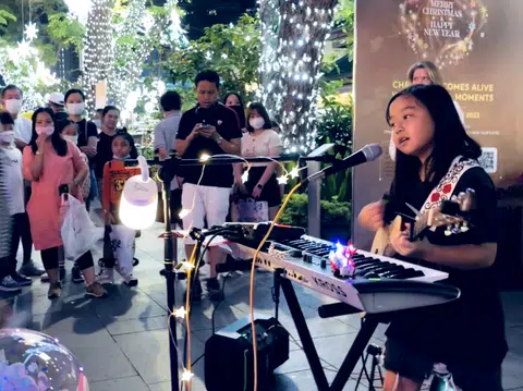 The sky's the limit for busker and songwriter Lyla Ng