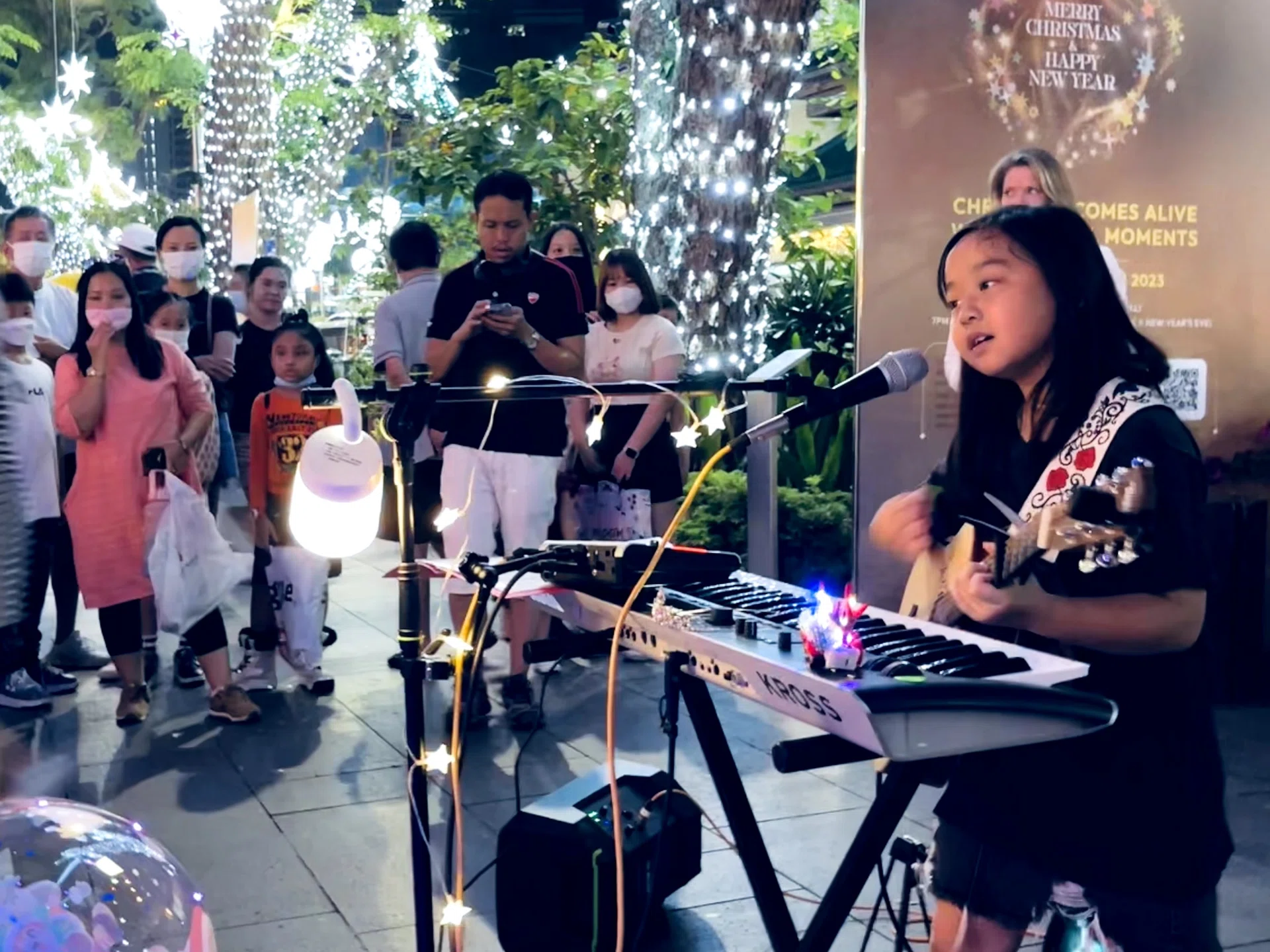 Lyla Ng, 10, performs Mandarin and English songs at various locations in Singapore.