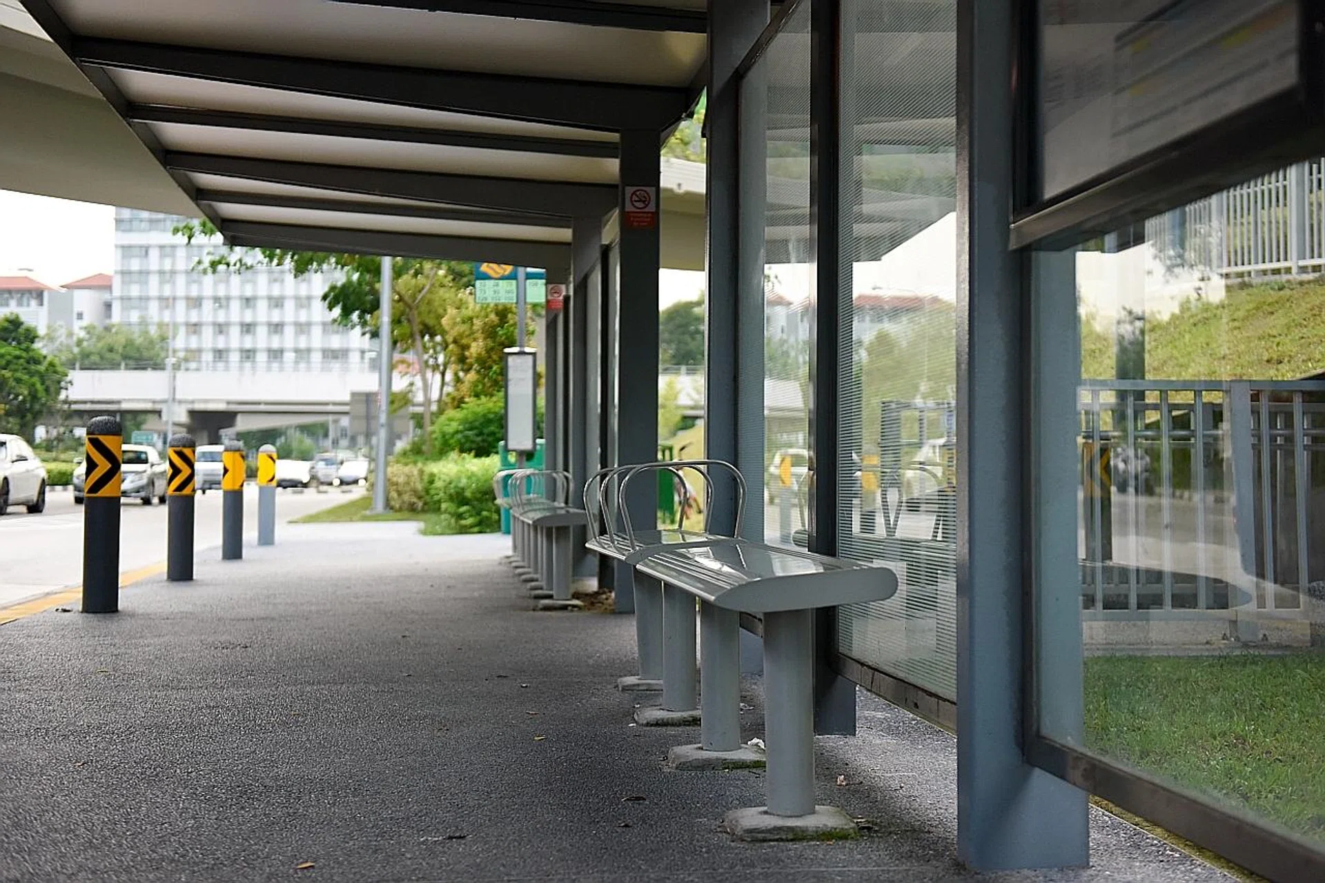 A bus stop in Braddell Road with the benches intact.