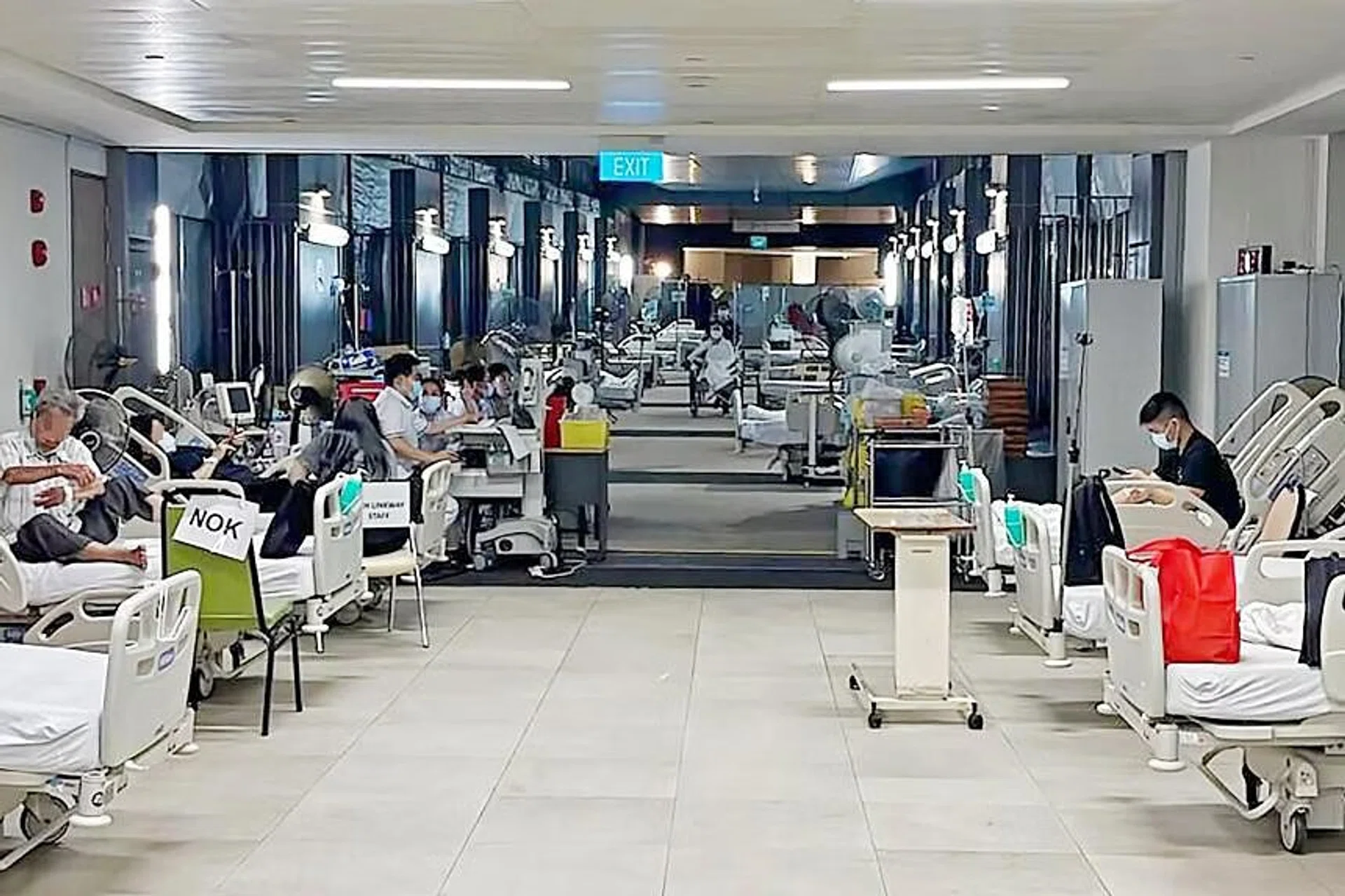 Some SGH emergency department patients are housed in a holding area at the linkway between SGH and Outram Community Hospital.