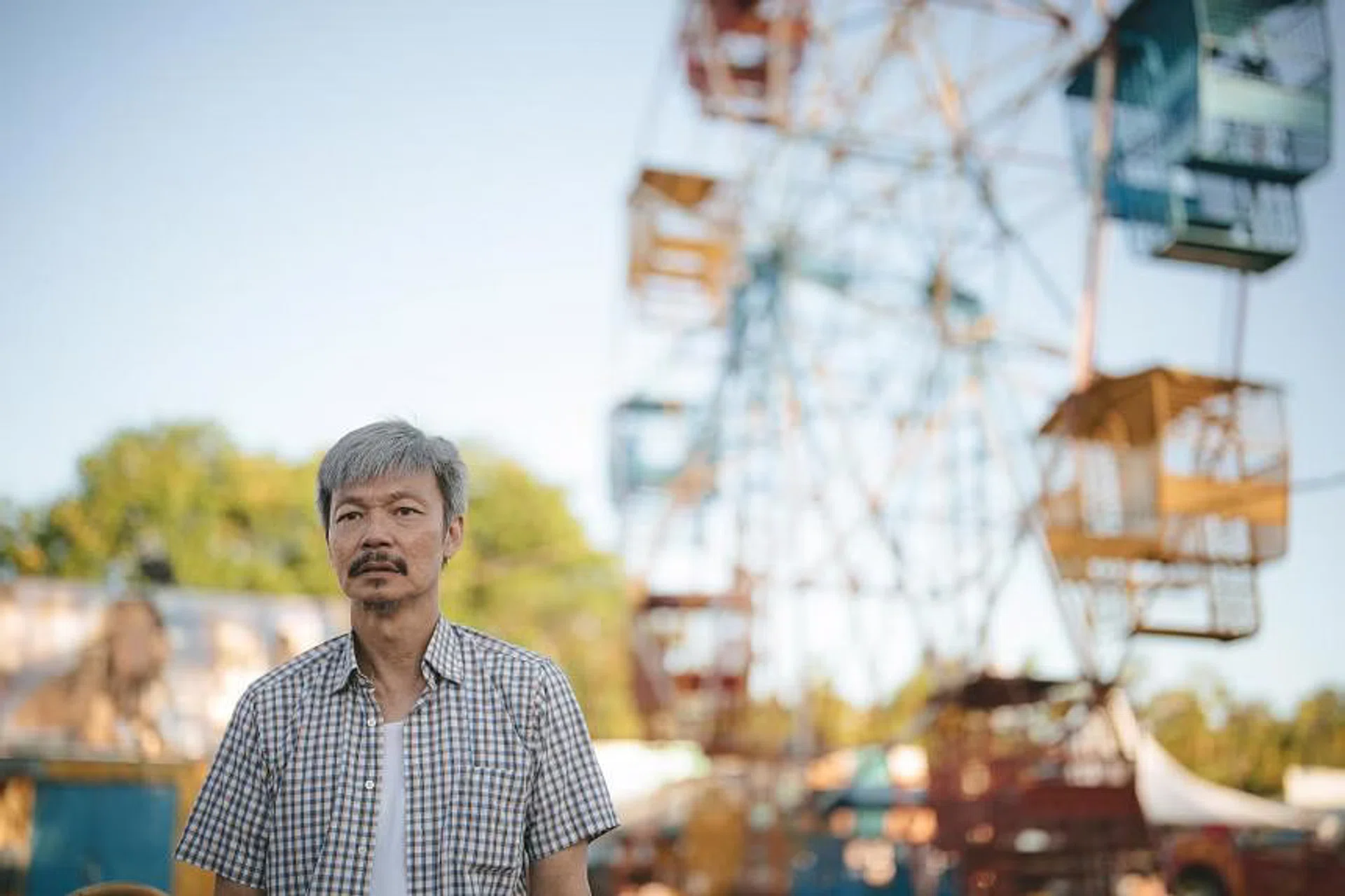 Mark Lee delivers a compelling performance as Loke, capturing the character's love for his daughter and the quiet desperation of his circumstances.