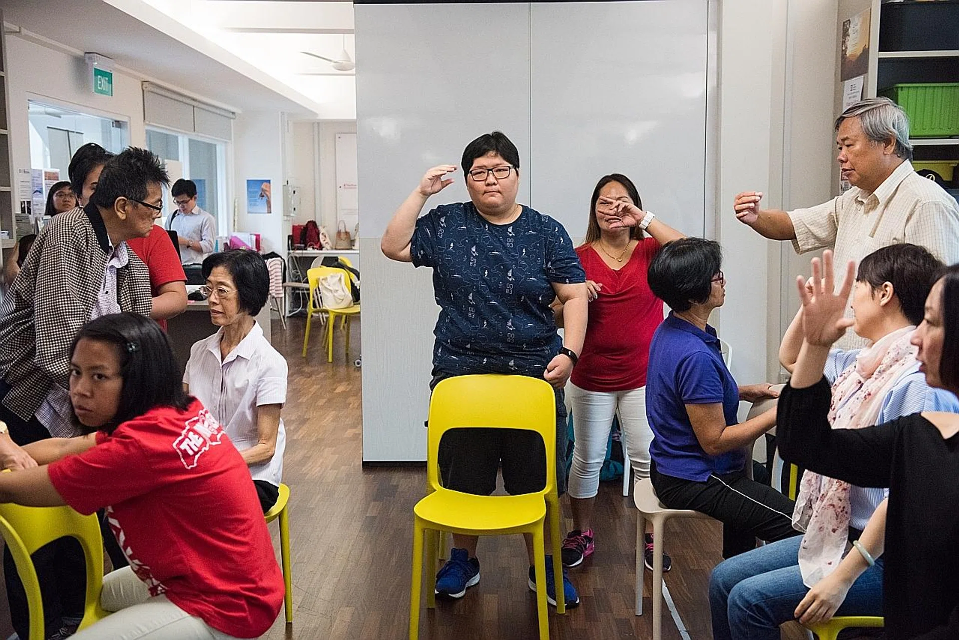 Ms Denise Hu participating in a K-pop dance session at Stroke Support Station (S3). 