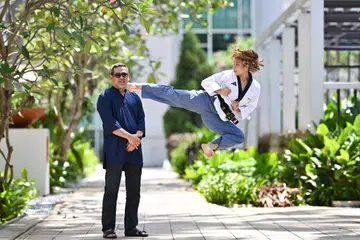 Dad's emotional support after her mum's death helps taekwondo champ fly high
