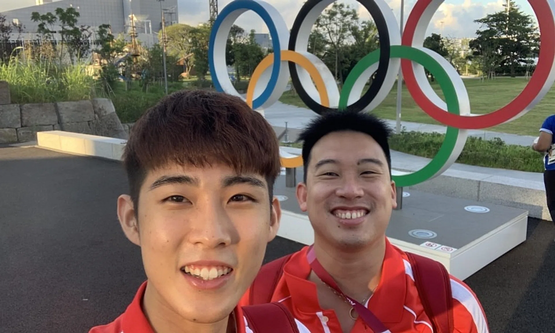 Singapore badminton national singles coach Kelvin Ho (right) and men's singles player Loh Kean Yew at the Paris Olympics.