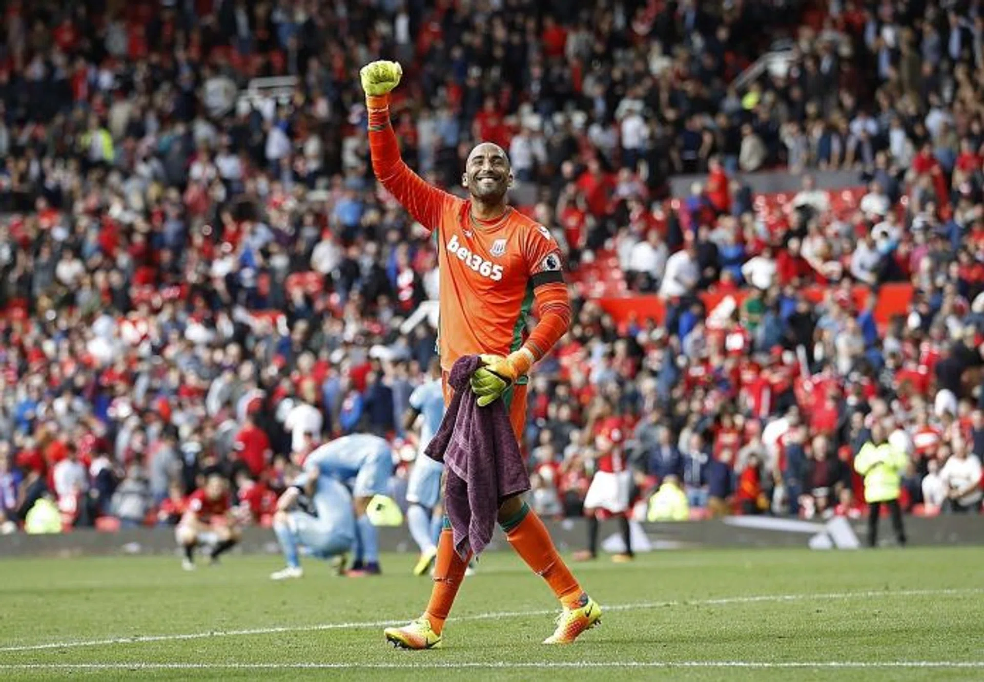 GRANT  THE GIANT: Stoke goalkeeper Lee Grant (above) pulling off a magnificent save from Man United striker Zlatan Ibrahimovic in the third minute.  