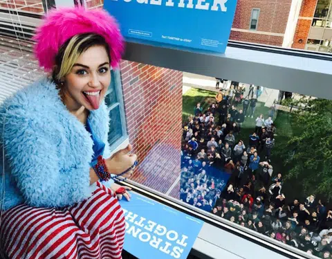 Miley supports Clinton with 'US flag' outfit