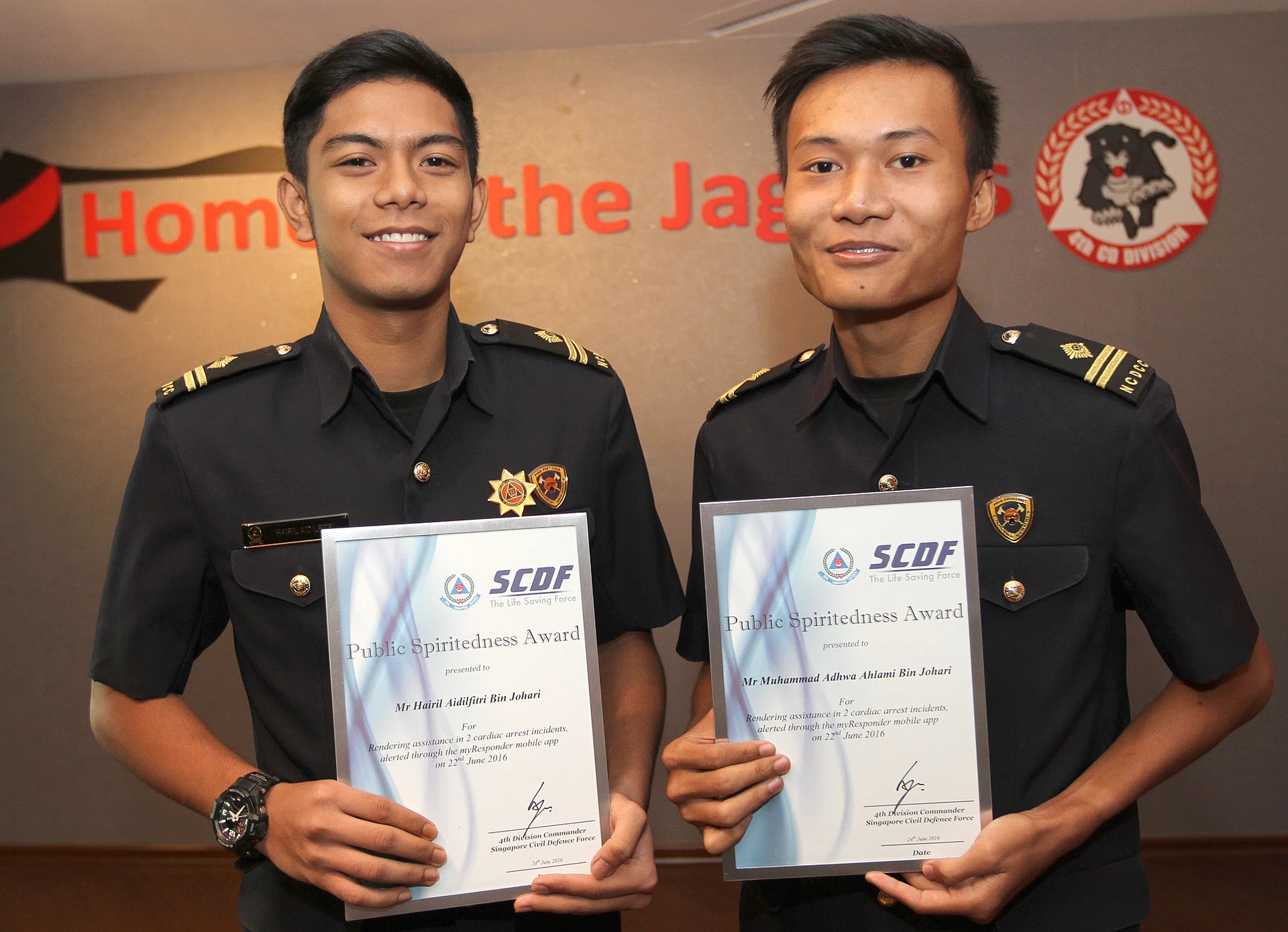 PROUD: Mr Hairil (left) and Mr Adhwa (right) with their Public Spiritedness awards. 