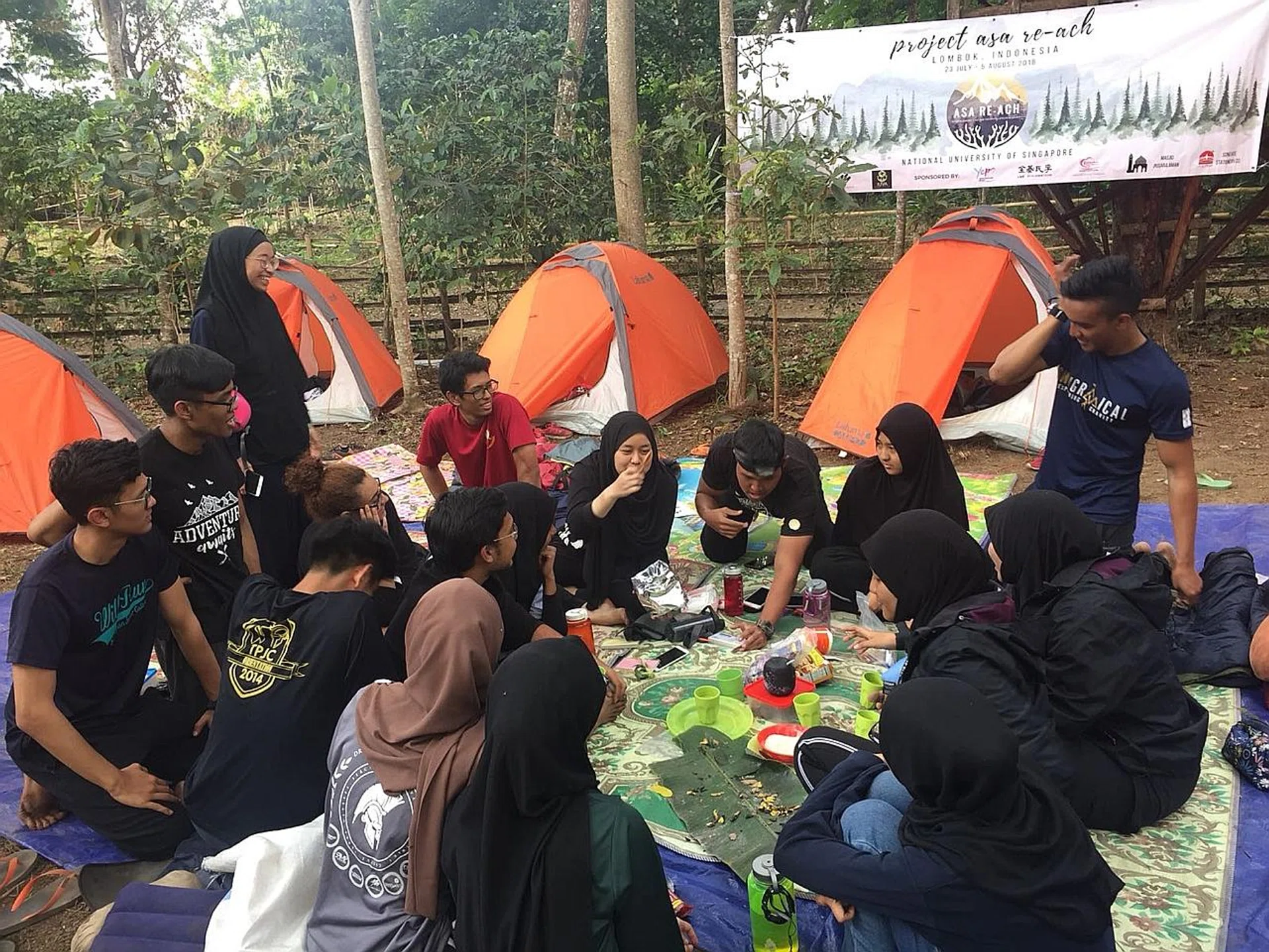 The students camped at an open area in Sembalun in north-east Lombok (above) after the quake on Sunday.