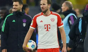 Kane hat-trick fires Bayern to 4-0 win at Dortmund
