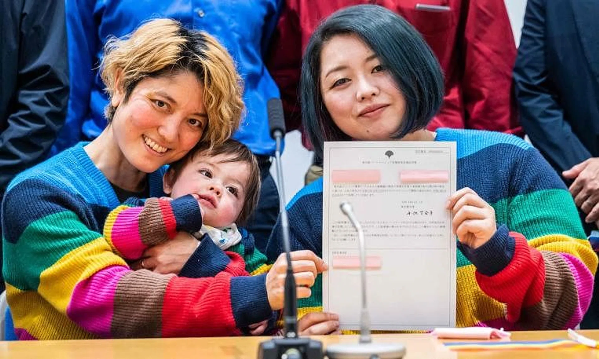 Ms Mamiko Moda (left), her partner Satoko Nagamura and their son with a same-sex partnership certificate in Tokyo.