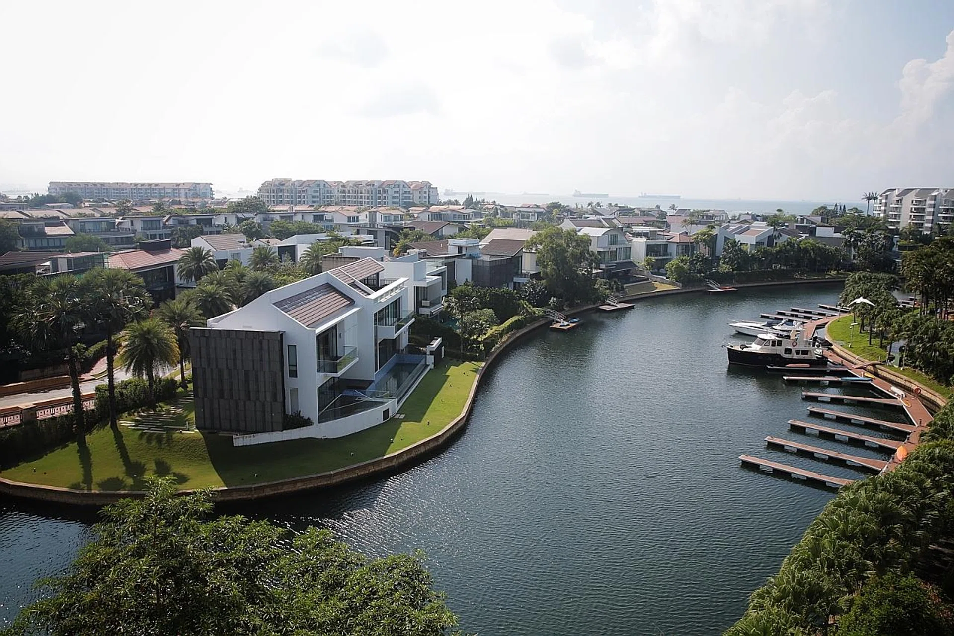 Foreigners are not allowed to buy landed homes in Singapore, except on the resort island of Sentosa (above). 