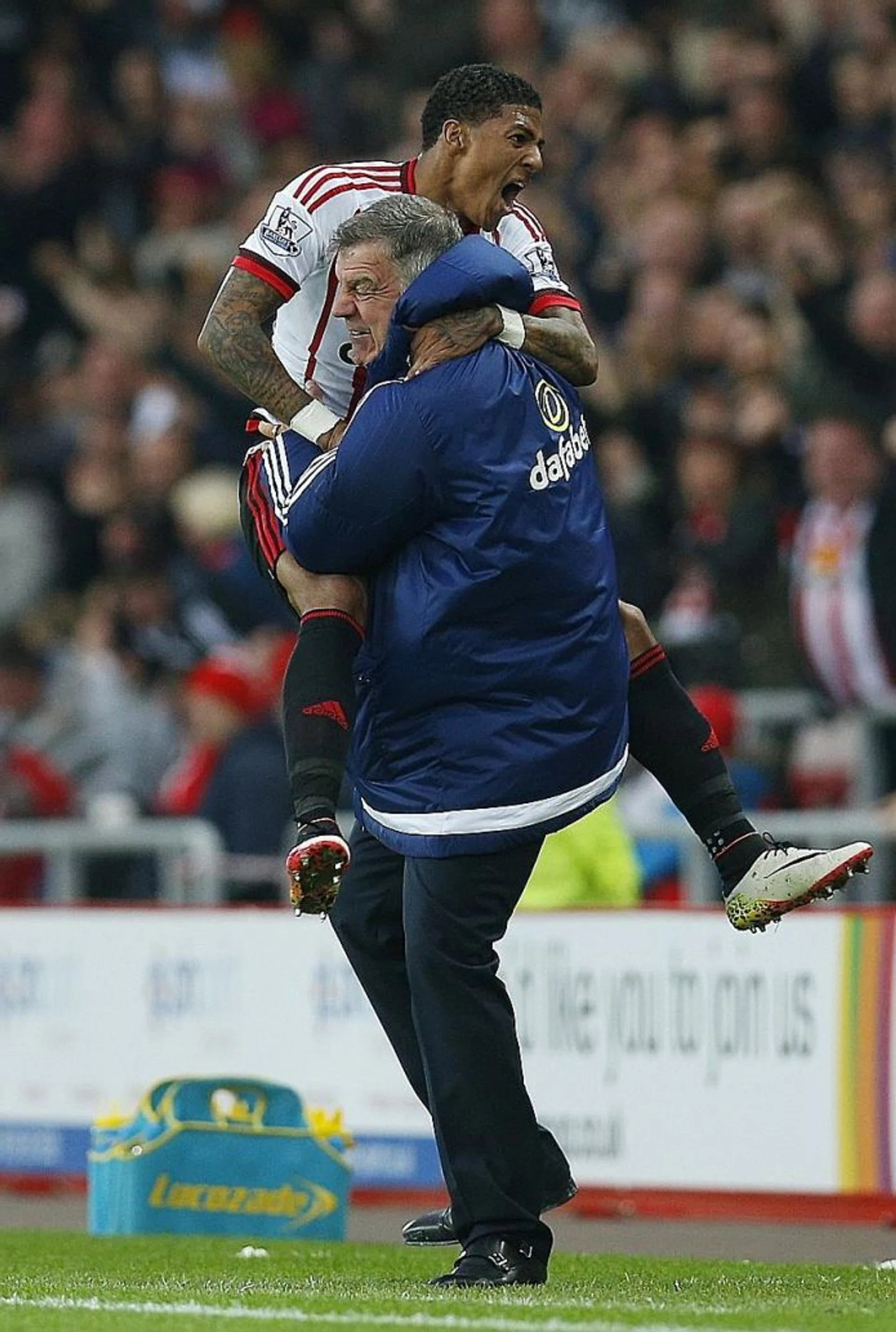 THE GREAT ESCAPE: Sam Allardyce (above) celebrates a goal with his defender Patrick van Aanholt en route to Sunderland's Premiership survival last season.  