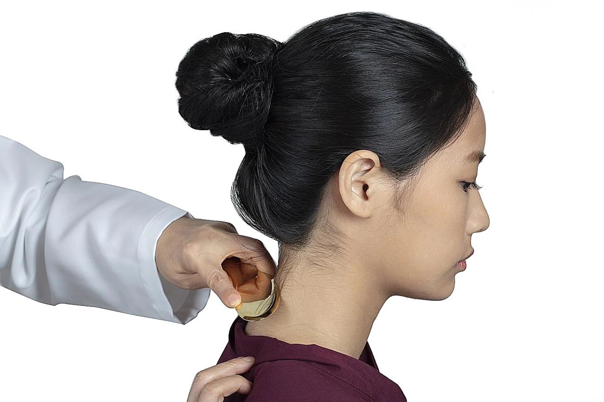 During gua sha treatment, the skin is lightly scraped using a scraping tool.