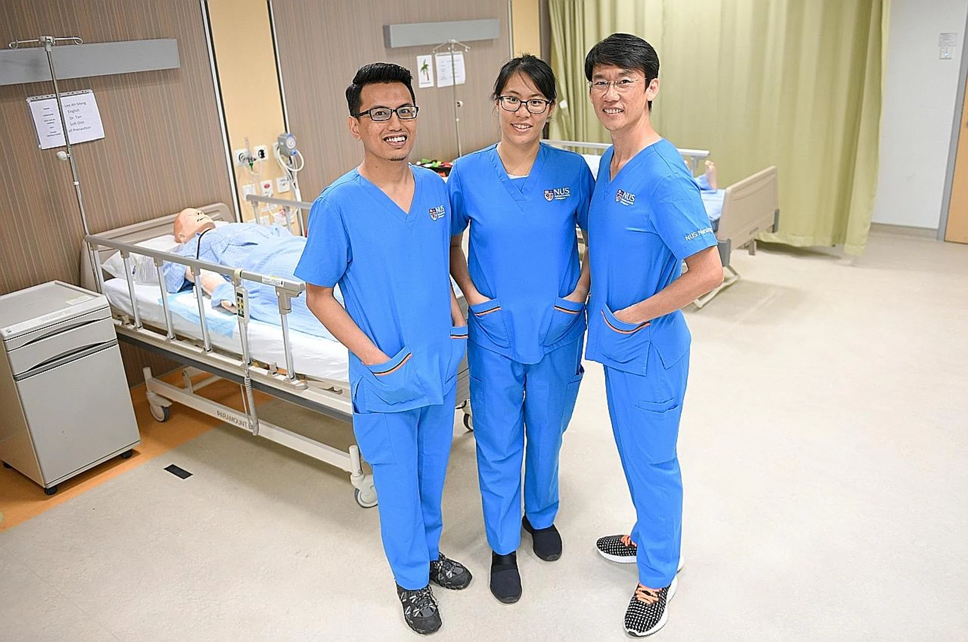 (From left) Mr Muhammad Rusydi,  Ms Joan Lim and Mr Dave Hio are part of the first batch of trainees for the Bachelor of Science (Nursing) Professional Conversion Programme. 