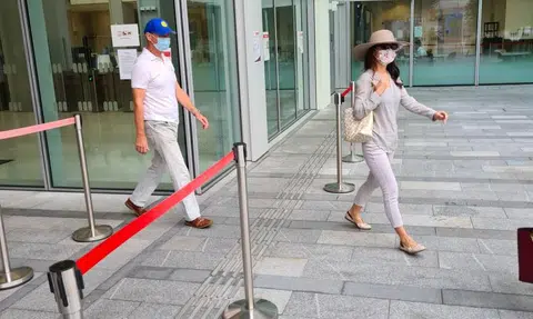 Couple charged in court over failure to wear masks properly at MBS