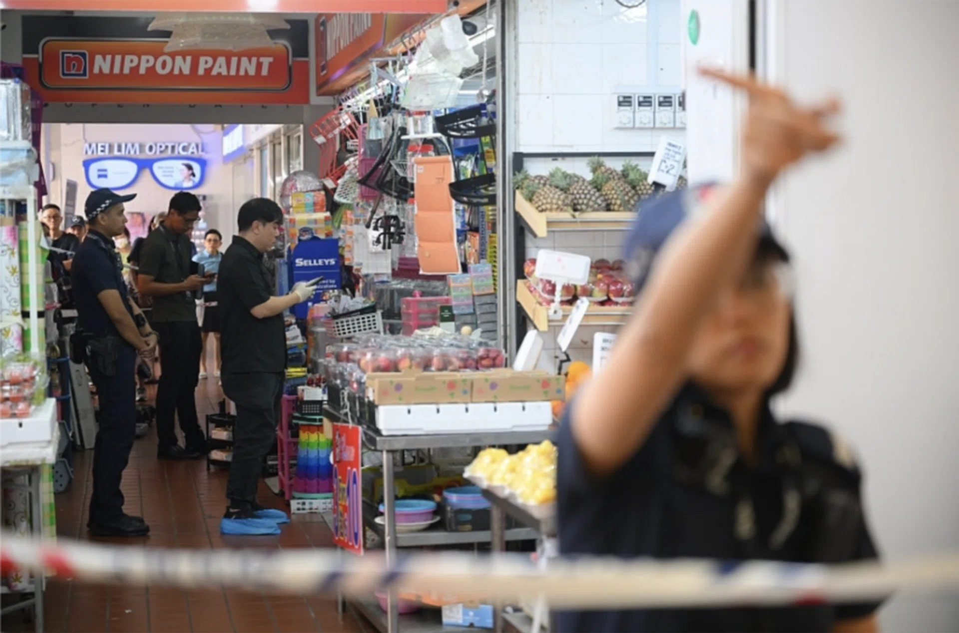 The incident happened at about 11am before shocked onlookers. Witnesses said they heard a woman screaming and saw the suspect brandishing a knife. 