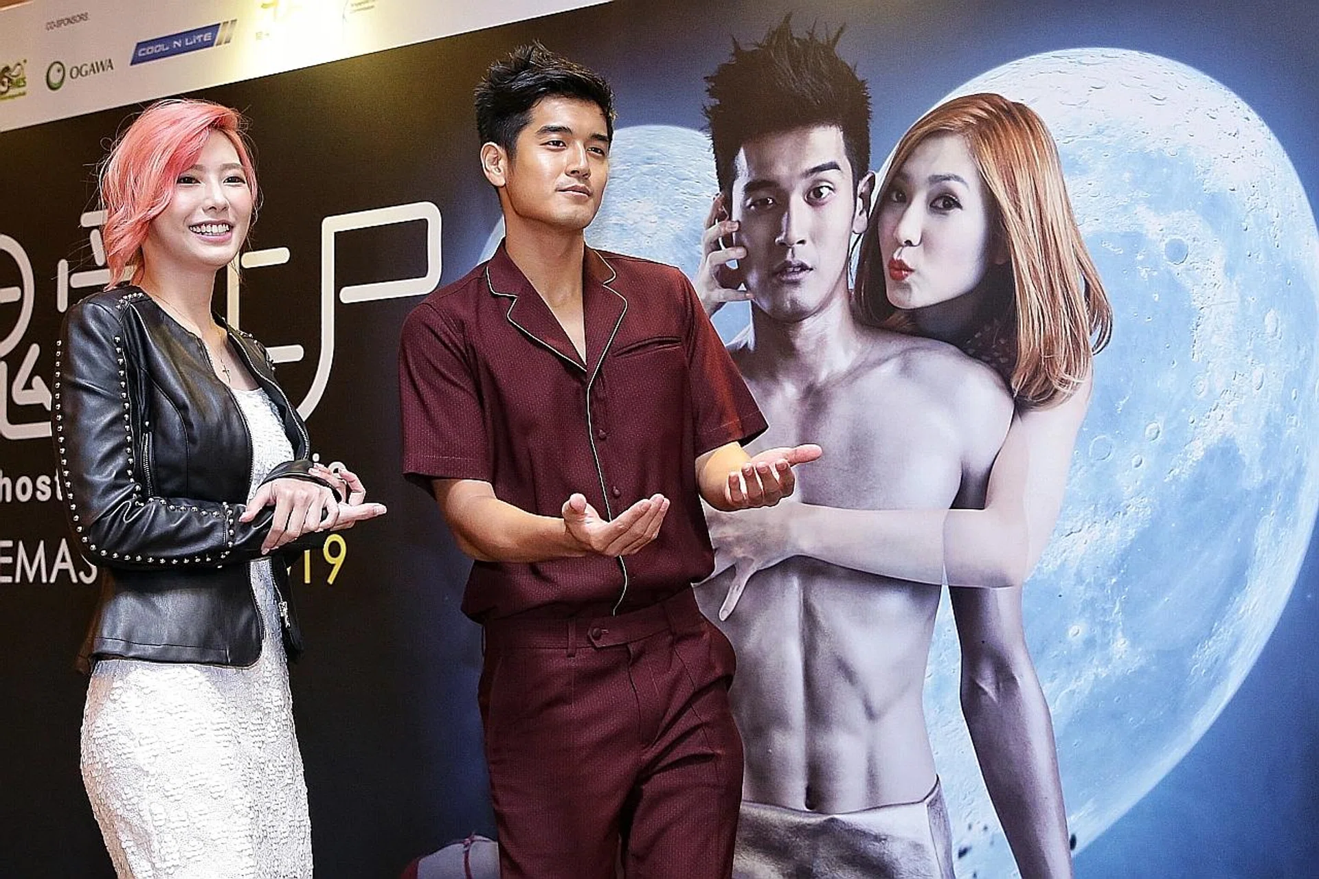 (Above) Ferlyn G and Nathan Hartono, who strips to gold hot pants in the movie. 