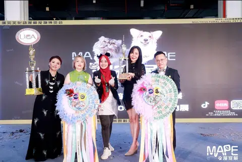 Cat groomer Aziemah Zakiyyah Azmi (centre) was placed third in two categories at the Universal Cat Association Cat Groomer Elite Competition.