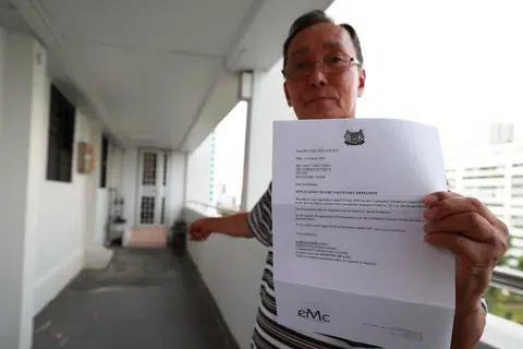 Marsiling resident washes corridor daily with 'exorcism water' to get rid of 'evil spirits'