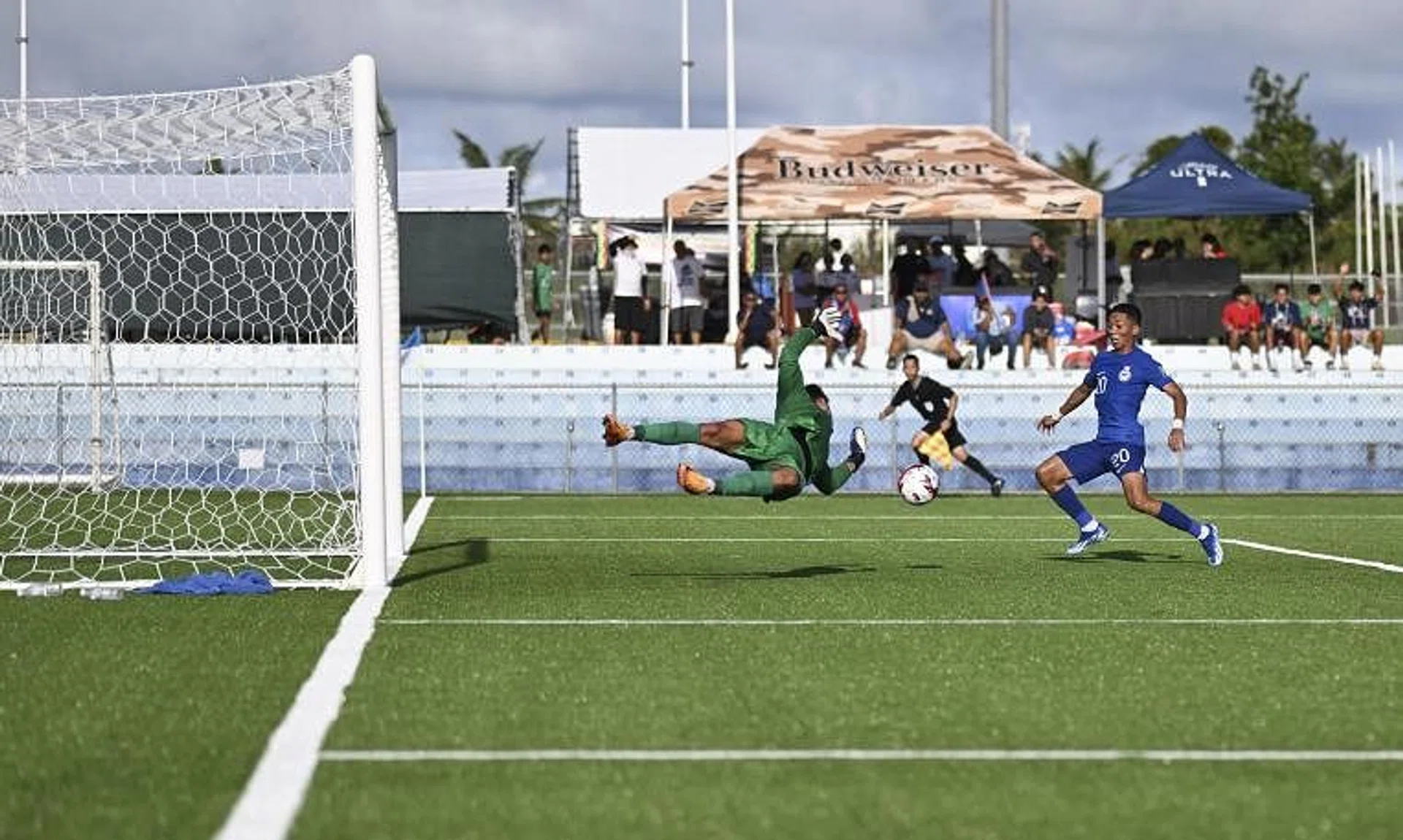 Singapore forward Shawal Anuar (right) made amends for his misses in the first leg to score the winner in the second leg against Guam.