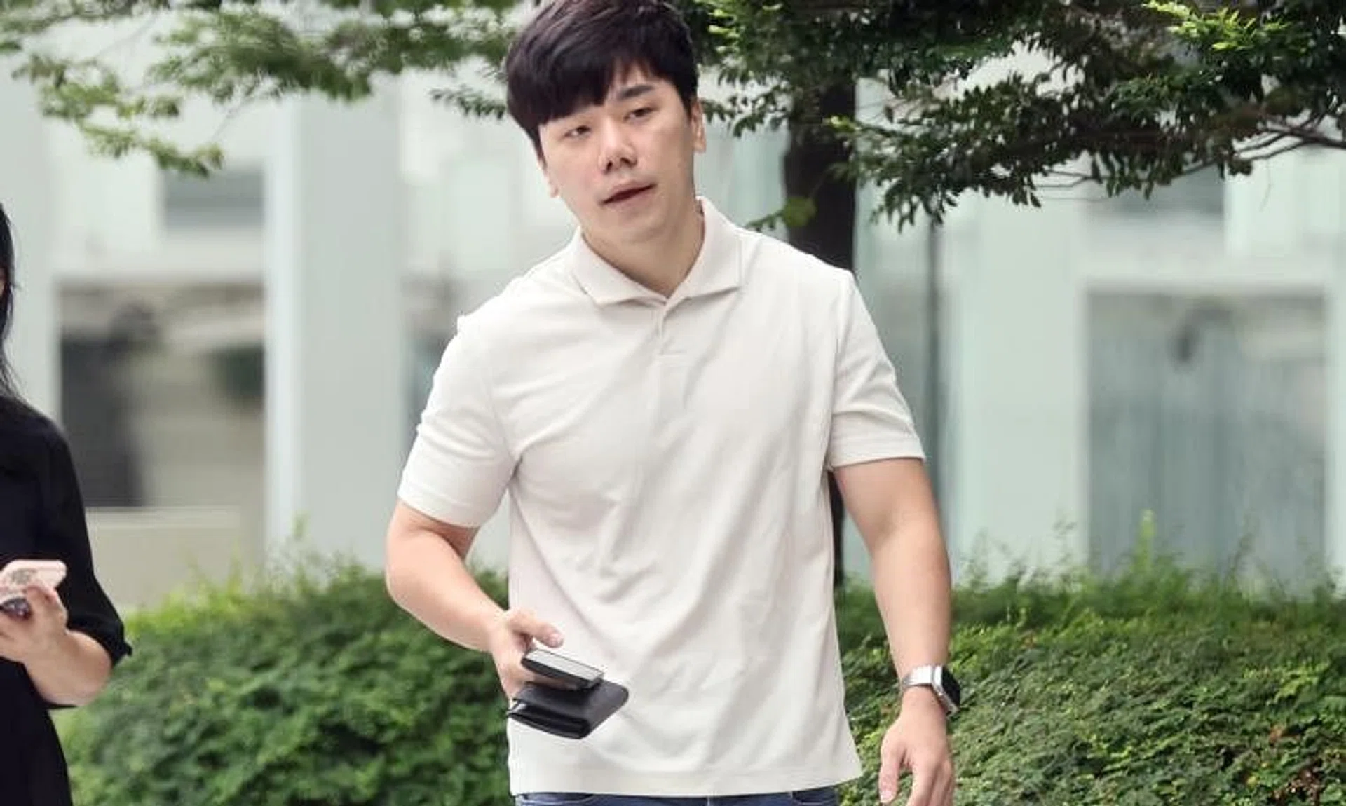 Lek Tai Yong at the State Courts in October 2023. He was jailed on Feb 14 after pleading guilty to one count of criminal breach of trust.