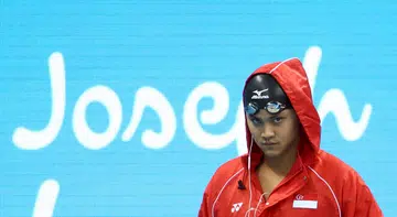 Which songs get Joseph Schooling's head in the game?