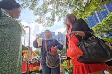 Maids set up illegal side hustle outside mall, draws ire from nearby business owners