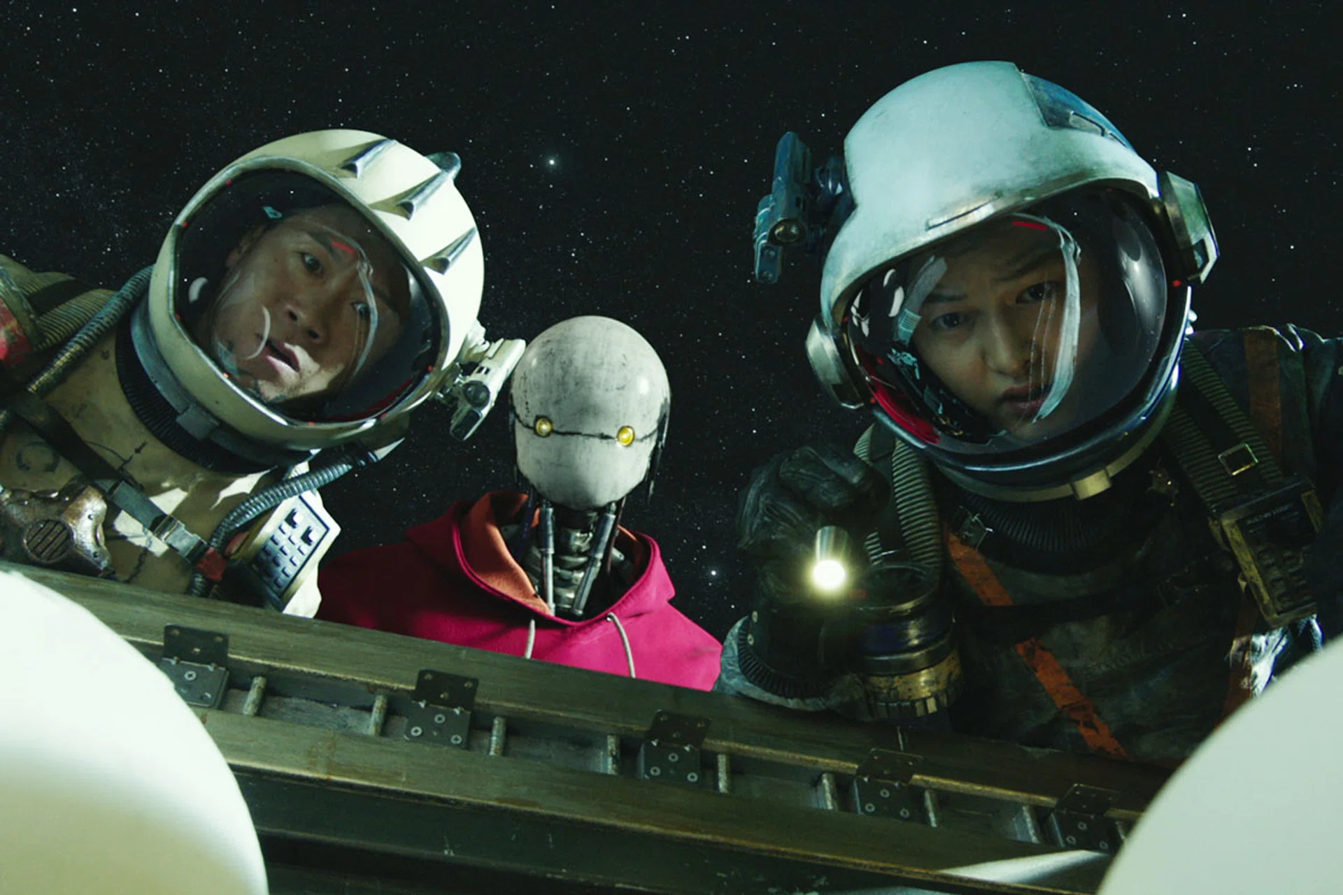 (From left) Jin Seon-kyu, Yoo Hai-jin and Song Joong-ki deliver the goods in Space Sweepers, an entertaining though not particularly innovative science-fiction flick.