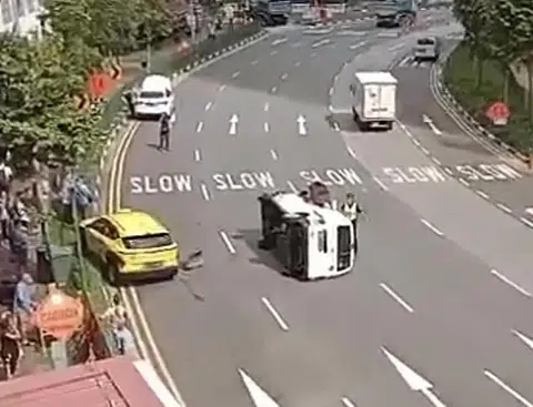 Van flips after collision with taxi in Chinatown