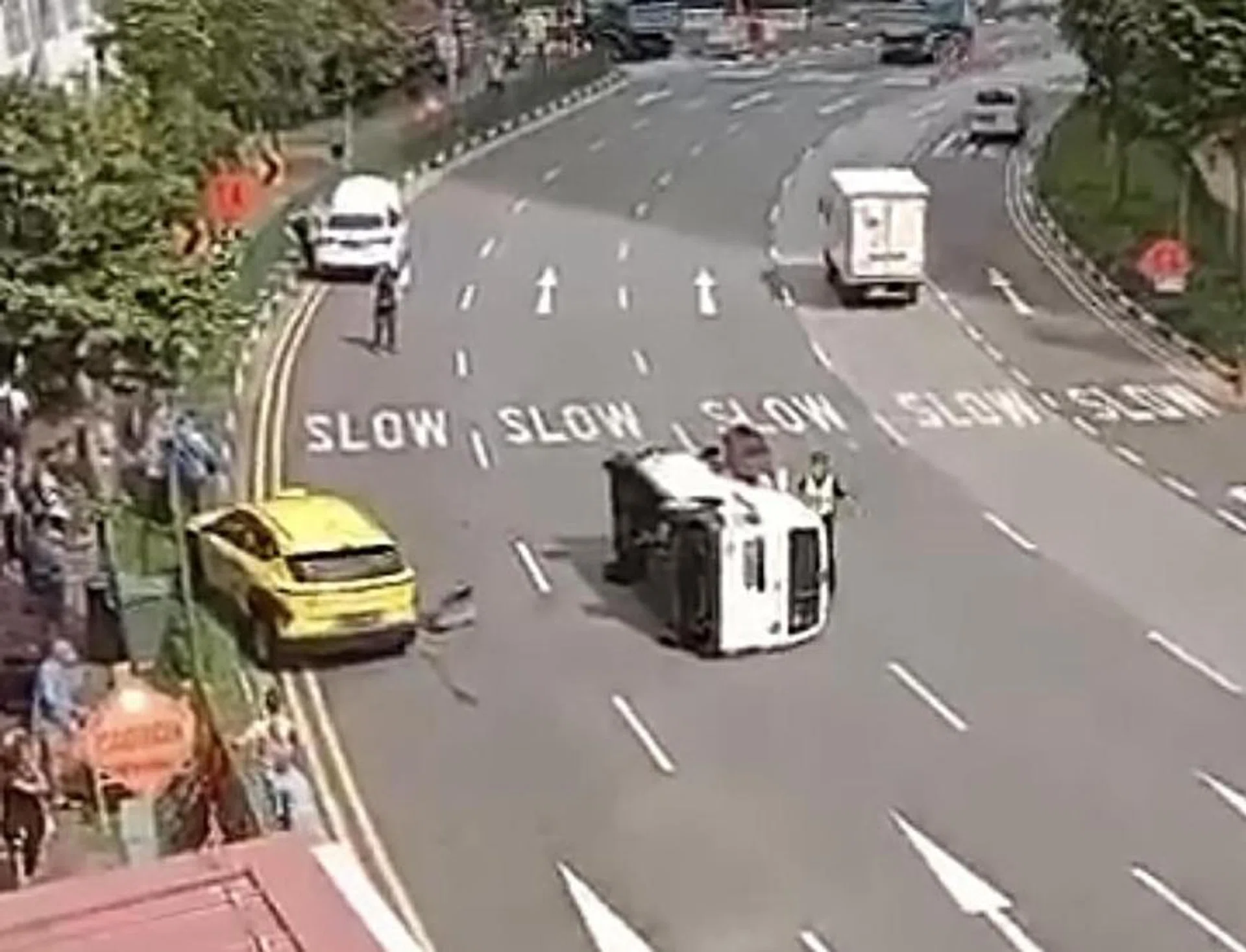 The driver managed to escape through the van's window with the help of passers-by.