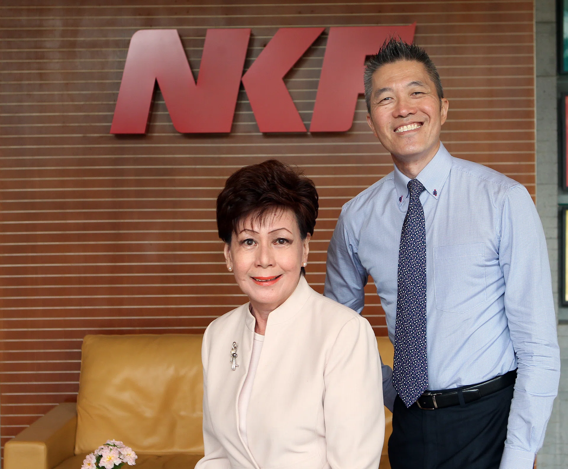 PREDECESSOR: Former chief executive of NKF Edmund Kwok and the CEO before him, Mrs Eunice Tay, who retired in November 2013. ST FILE PHOTO